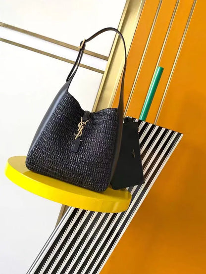 LE 37 woven raffia and vegetable-tanned leather bag